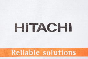 Hitachi Construction Machinery signboard and logo